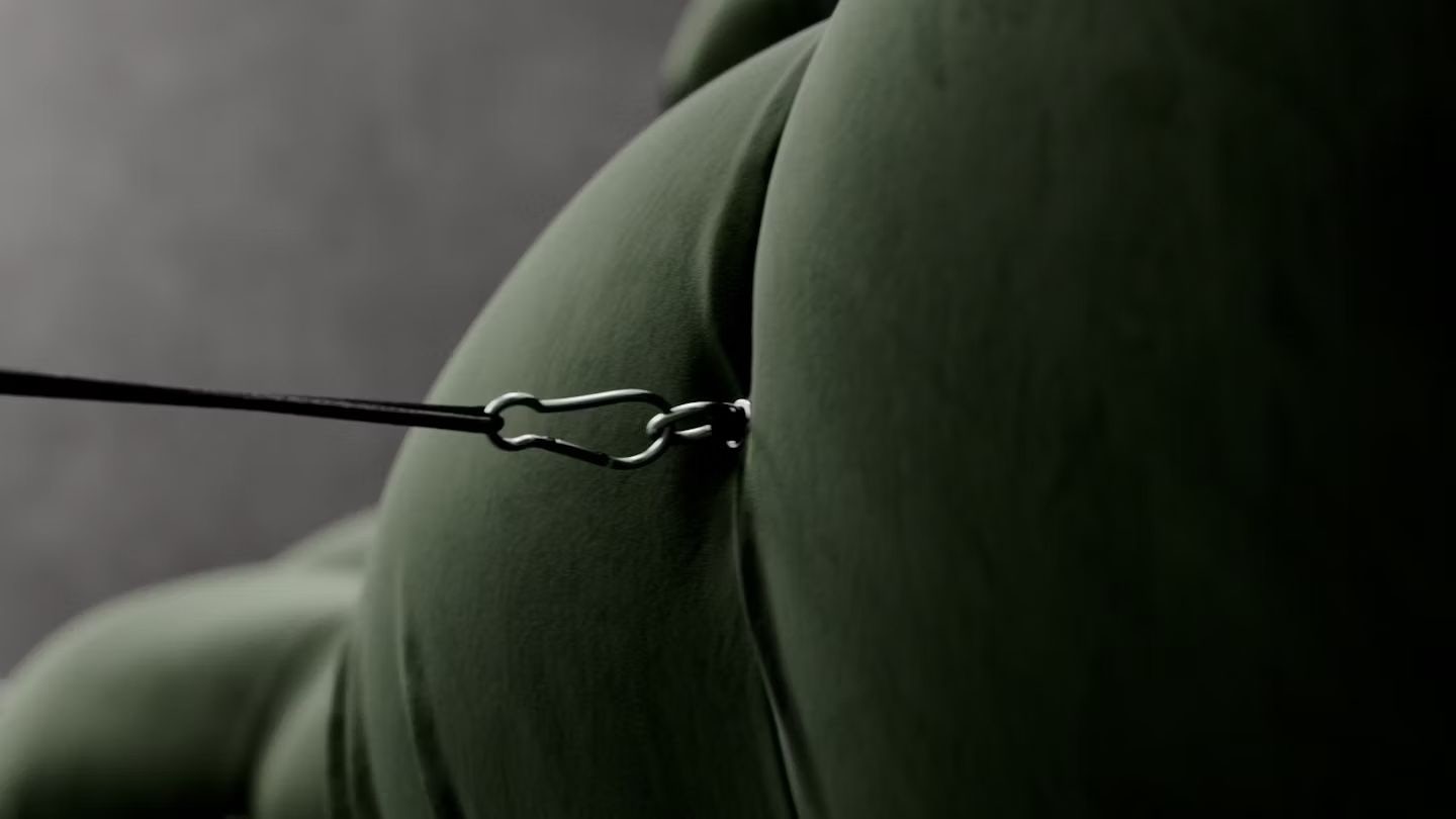 Close-up of a mechanism detail on a B&B Italia sofa.