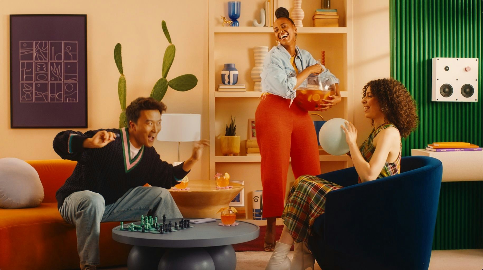 Three people in a living room, as featured in a Kijiji advertising campaign directed by Camille Boyer