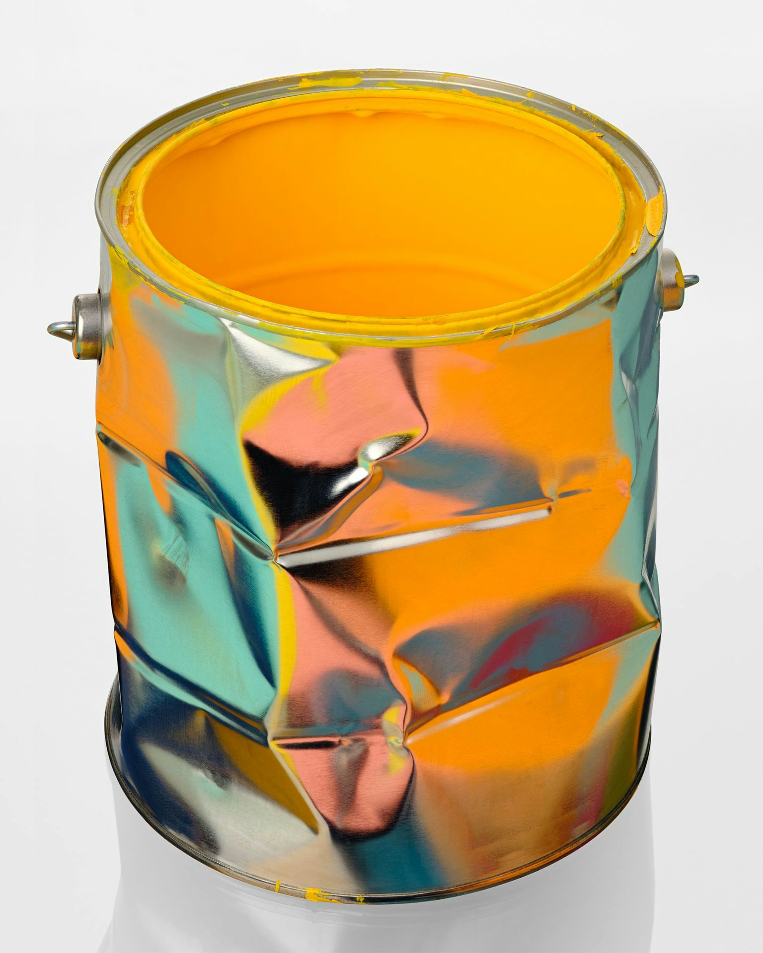 An old paint can reflecting light.