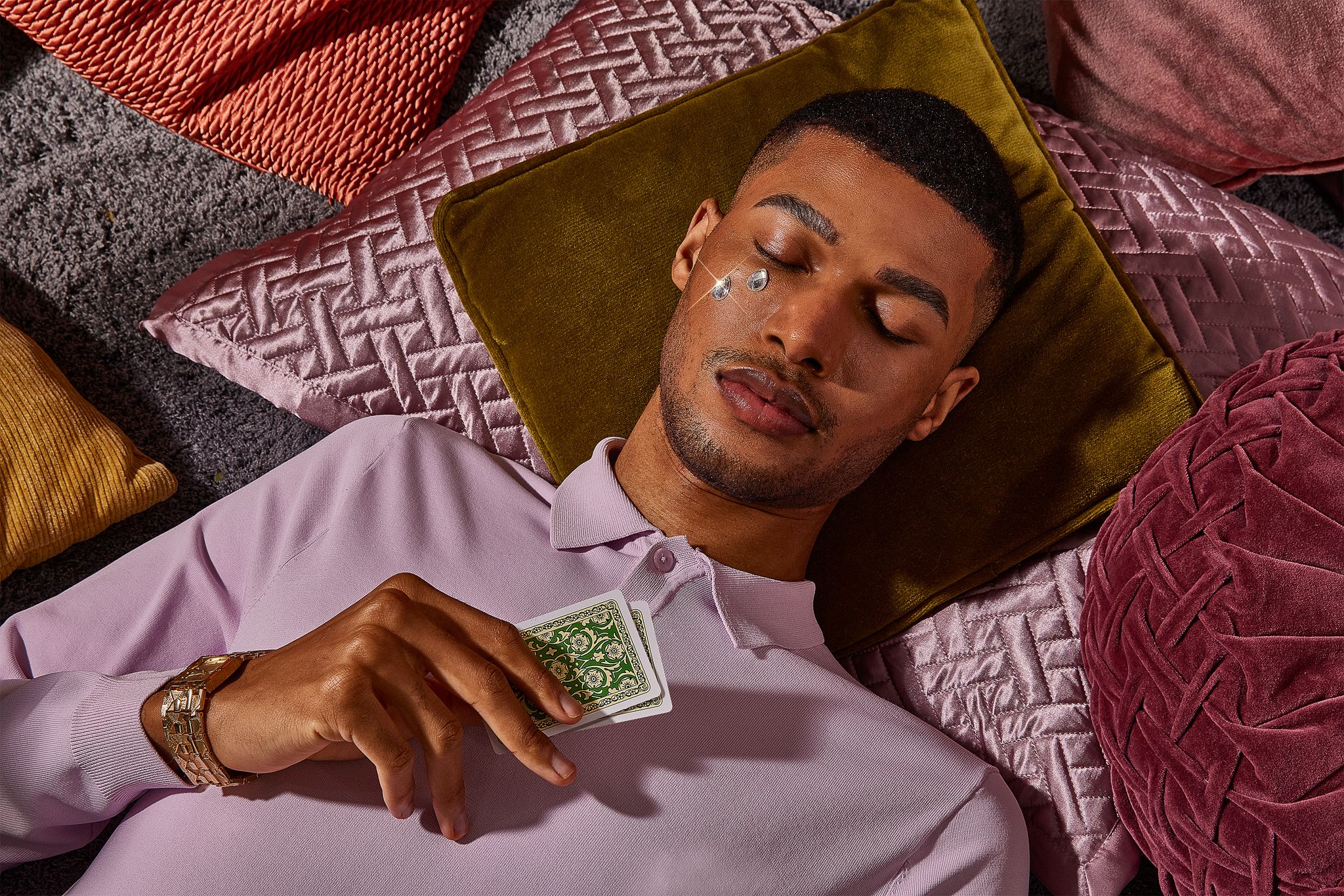 man with tarot cards