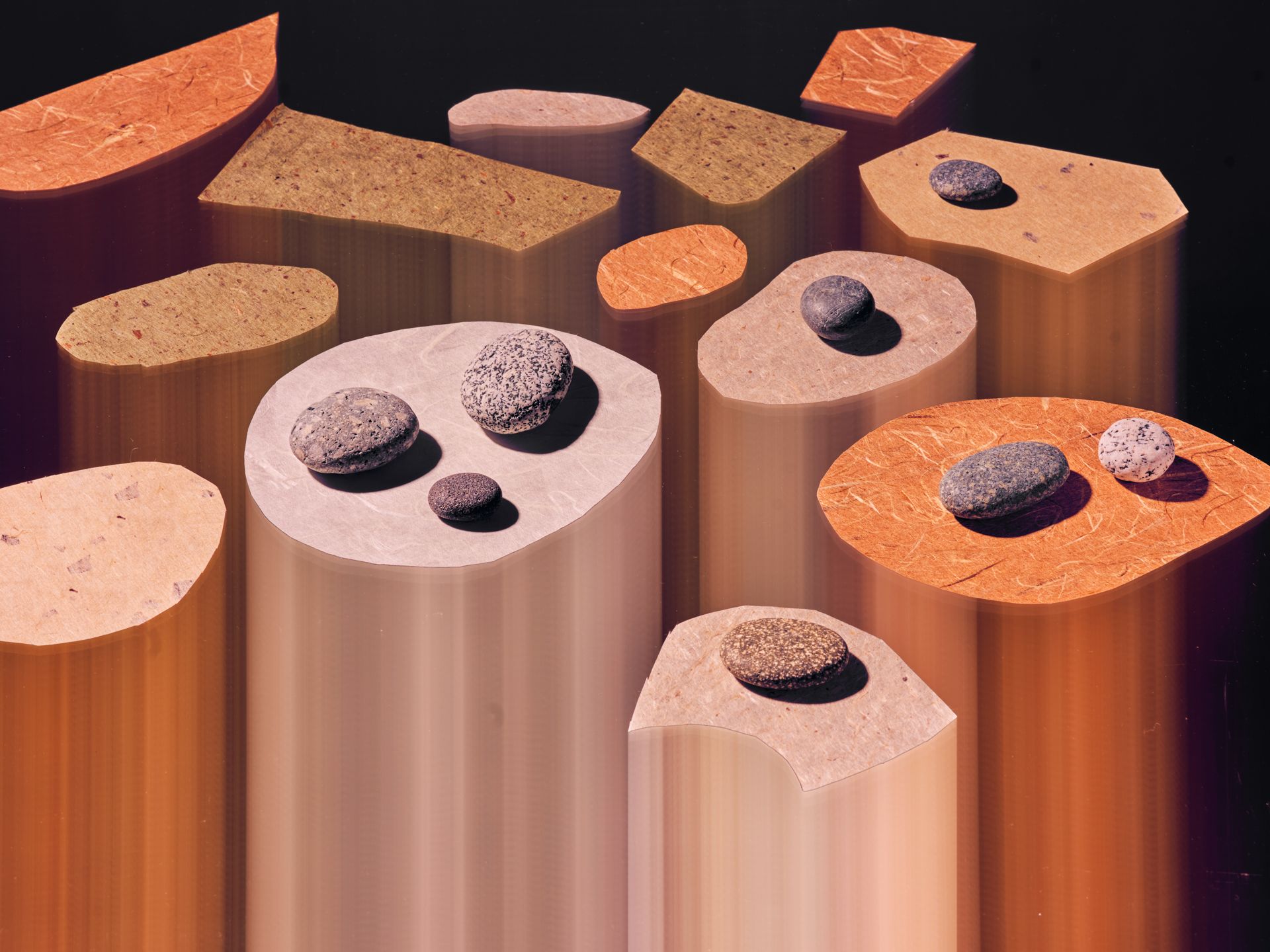 Polished stones on surfaces in a long-exposure photo.