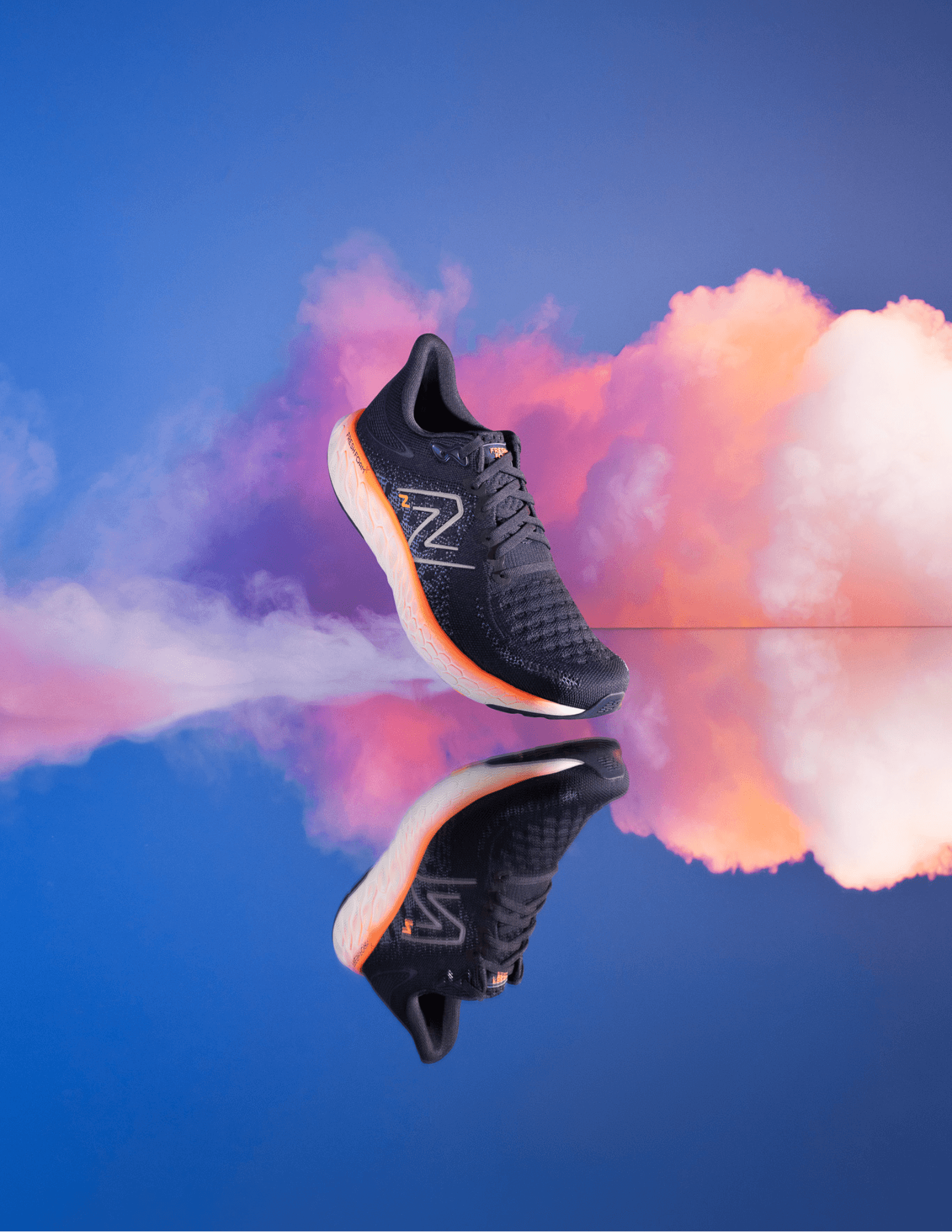 A New Balance shoe floats and reflects on water.